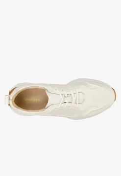 Beżowe sneakersy damskie z ozdobnymi tłoczeniami