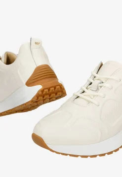 Beżowe sneakersy damskie z ozdobnymi tłoczeniami